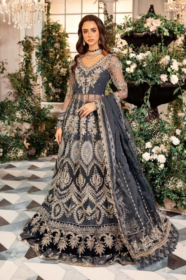 "Elegant navy blue bridal lehenga adorned with intricate gold embroidery and beadwork, perfect for a luxury wedding look."