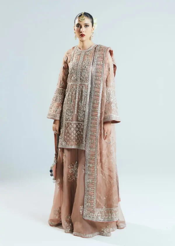 Elegant hand-embellished peach lehenga dress for brides