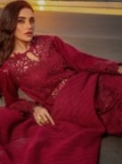 Schiffli embroidered 3-piece lawn suit for women, featuring intricate embroidery, unstitched premium lawn fabric, and a beautifully crafted dupatta, perfect for Eid 2025 and summer fashion.