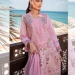 Elegant pink Schiffli embroidered dress with delicate 3D embellishments and organza dupatta.