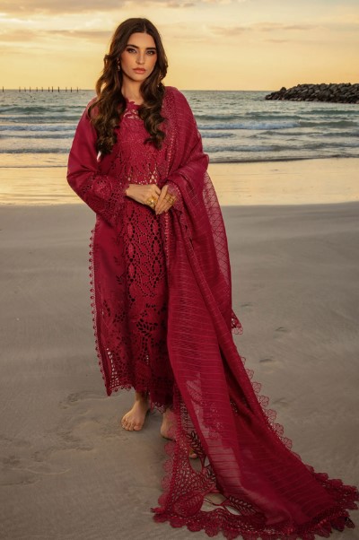 Schiffli embroidered 3-piece lawn suit for women, featuring intricate embroidery, unstitched premium lawn fabric, and a beautifully crafted dupatta, perfect for Eid 2025 and summer fashion.
