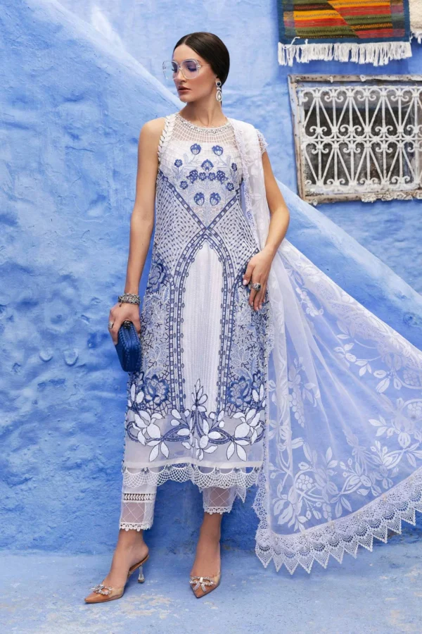 Close-up of designer cross stitch embroidery on sleeveless dress