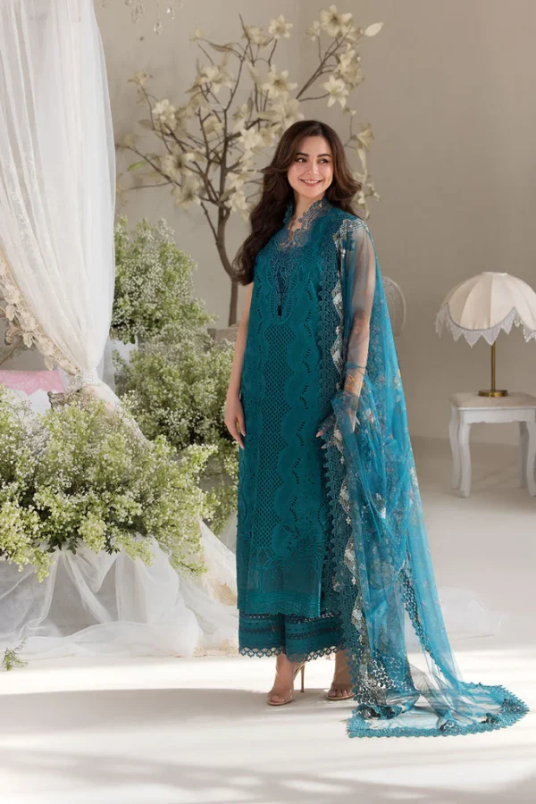 Sobia Nazir Teal outfit featuring intricate embroidery and lace details.