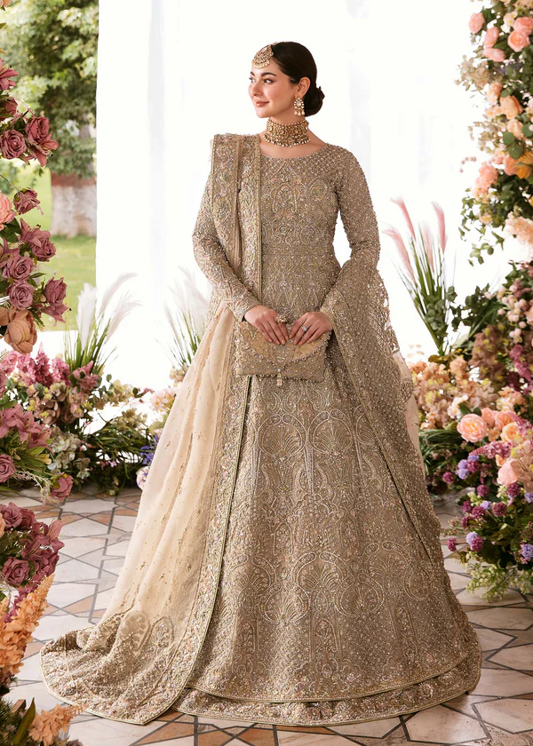 Pakistani bridal maxi dress for wedding with intricate embroidery and elegant design, styled with a matching dupatta.