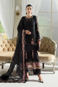 A full-length photo of a beautiful black Pakistani dress with intricate embroidery and a chiffon dupatta.