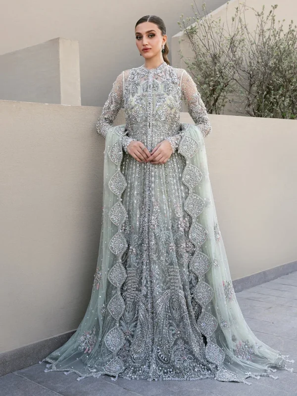 Mint green bridal dress pakistani gown with silver embroidery for Walima ceremony, featuring net dupatta.