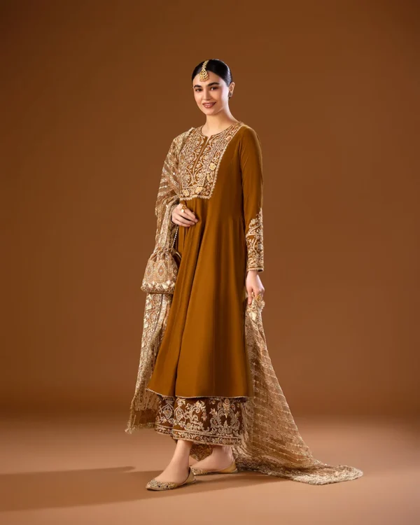 Floor-length gold organza dupatta with striped embroidery paired with a mustard Mehndi dress